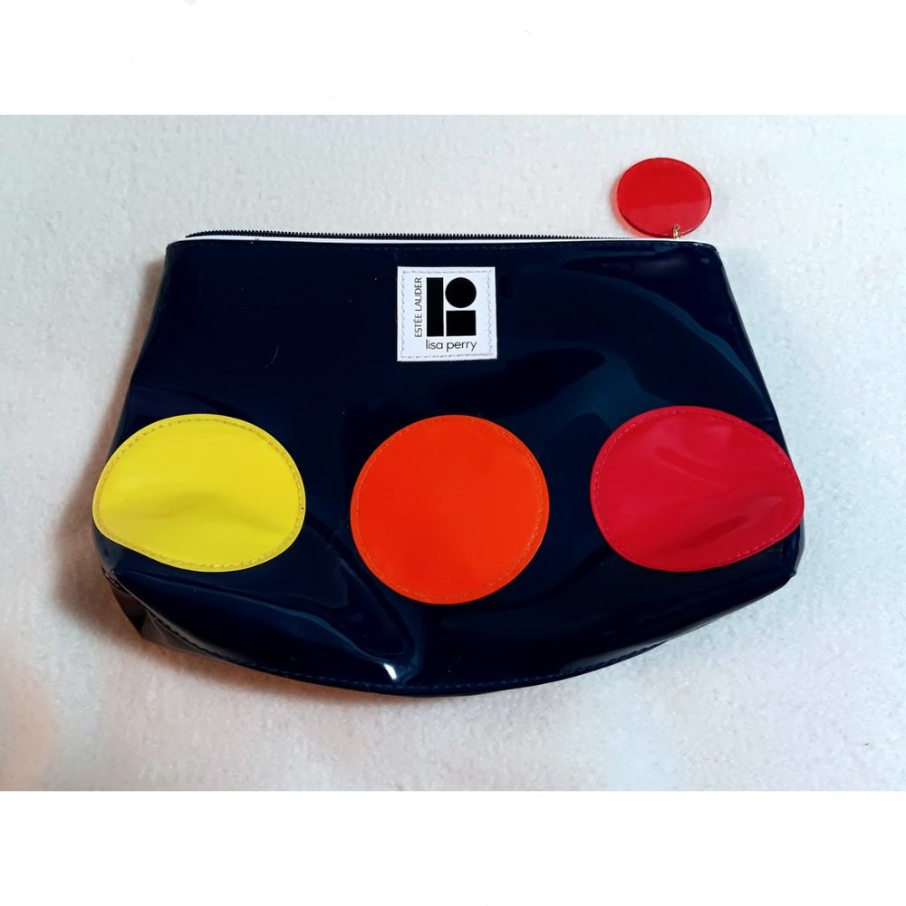 Estee Lauder Lisa Perry cosmetics bag - navy w/ circles - yellow orange red